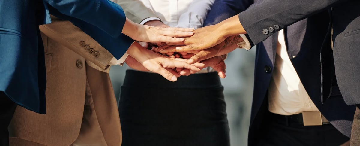 business-team-stacking-hands-2021-08-27-17-18-27-utc 1